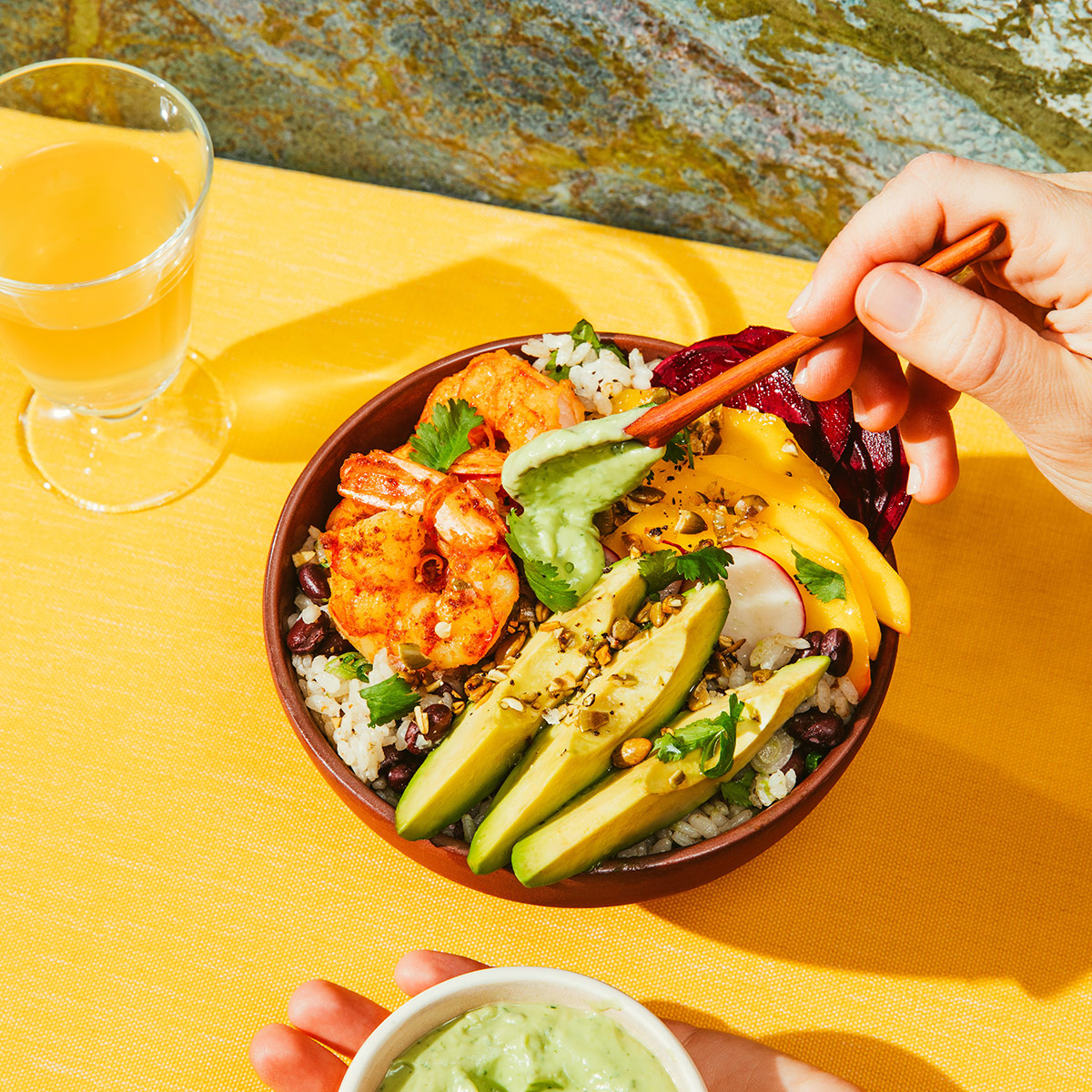 Spicy rice and black bean bowl with grilled shrimp and avocado sauce | Avocados from Mexico